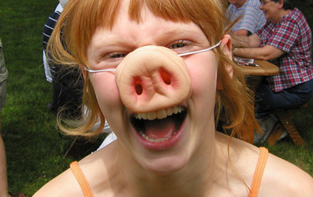 child with pig snout