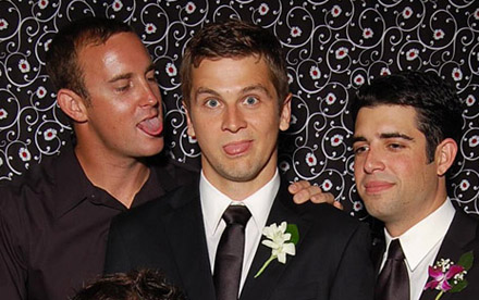 Groomsmen in wedding booth