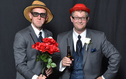Groomsmen in photo booth